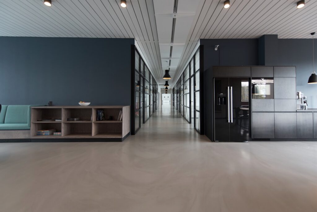 Modern office interior with frosted glass partitions and natural light