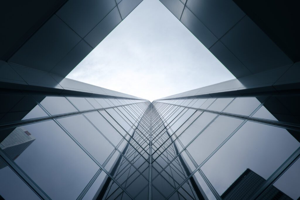 Reflective glass building exterior showing solar control window film effect in BC