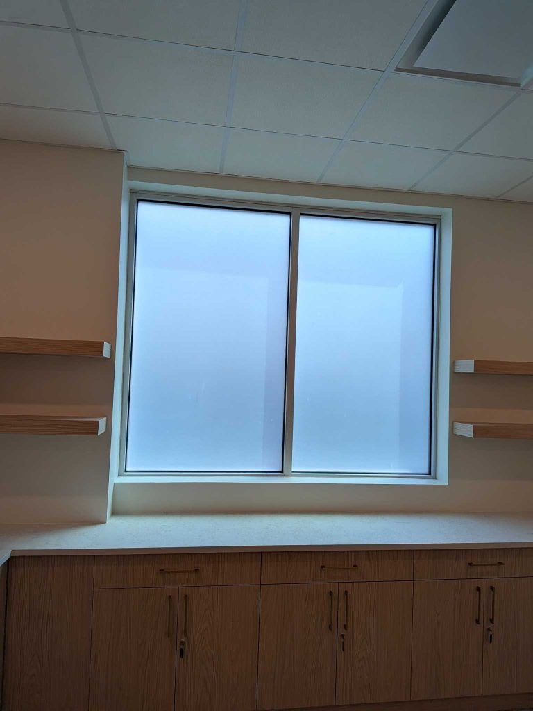 Frosted window film preserving daylight and privacy