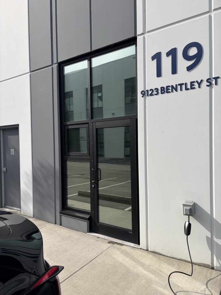Bentley project entrance before one-way privacy film installation