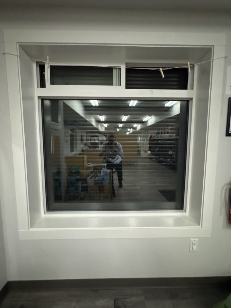 Interior security-film window at the MNBC project